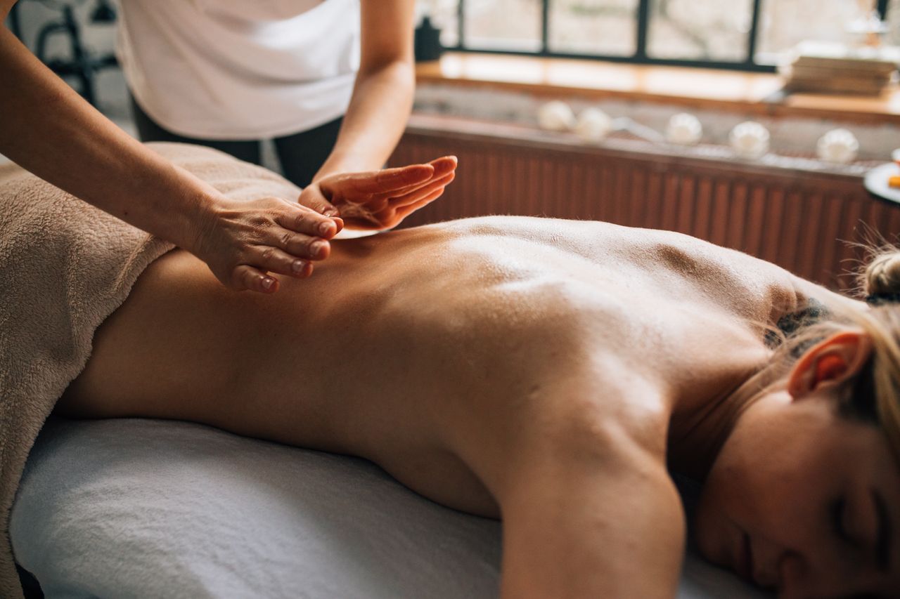 Home A serene massage therapy session indoors focusing on relaxation and self-care.