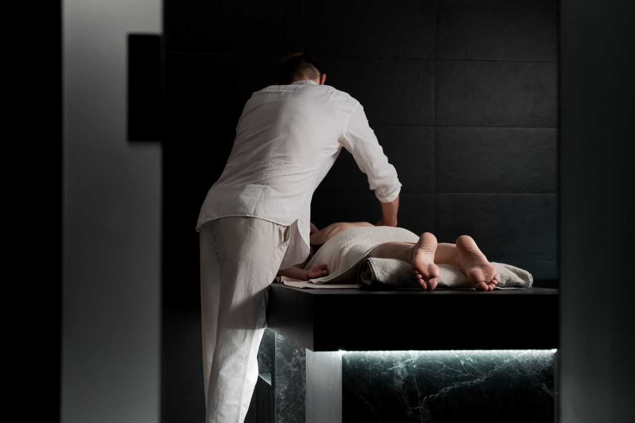 Services A relaxing massage in a spa setting focusing on soothing therapy and wellbeing.